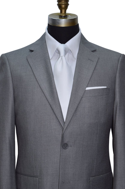 very close up front view of Men's Gray wedding suit with a long white dress tie on a mannequin against a white background