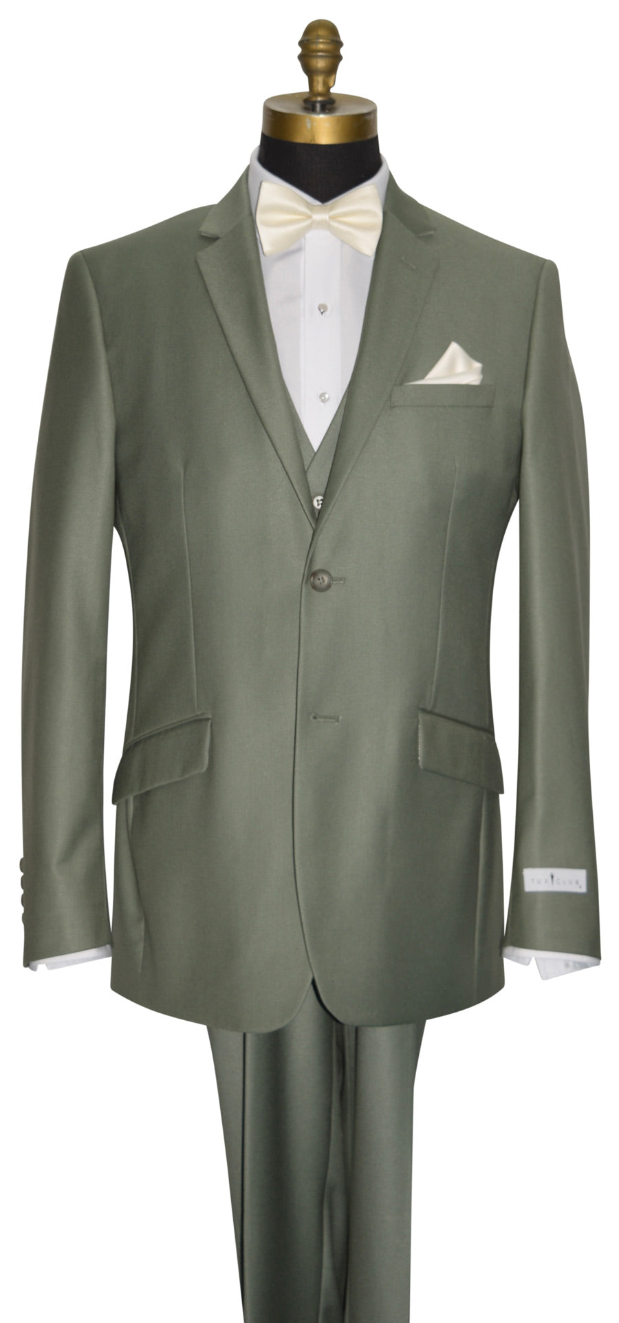 close-up life size mannequin wearing a sage colored men's 3 piece suit with an ivory bowtie against a white background