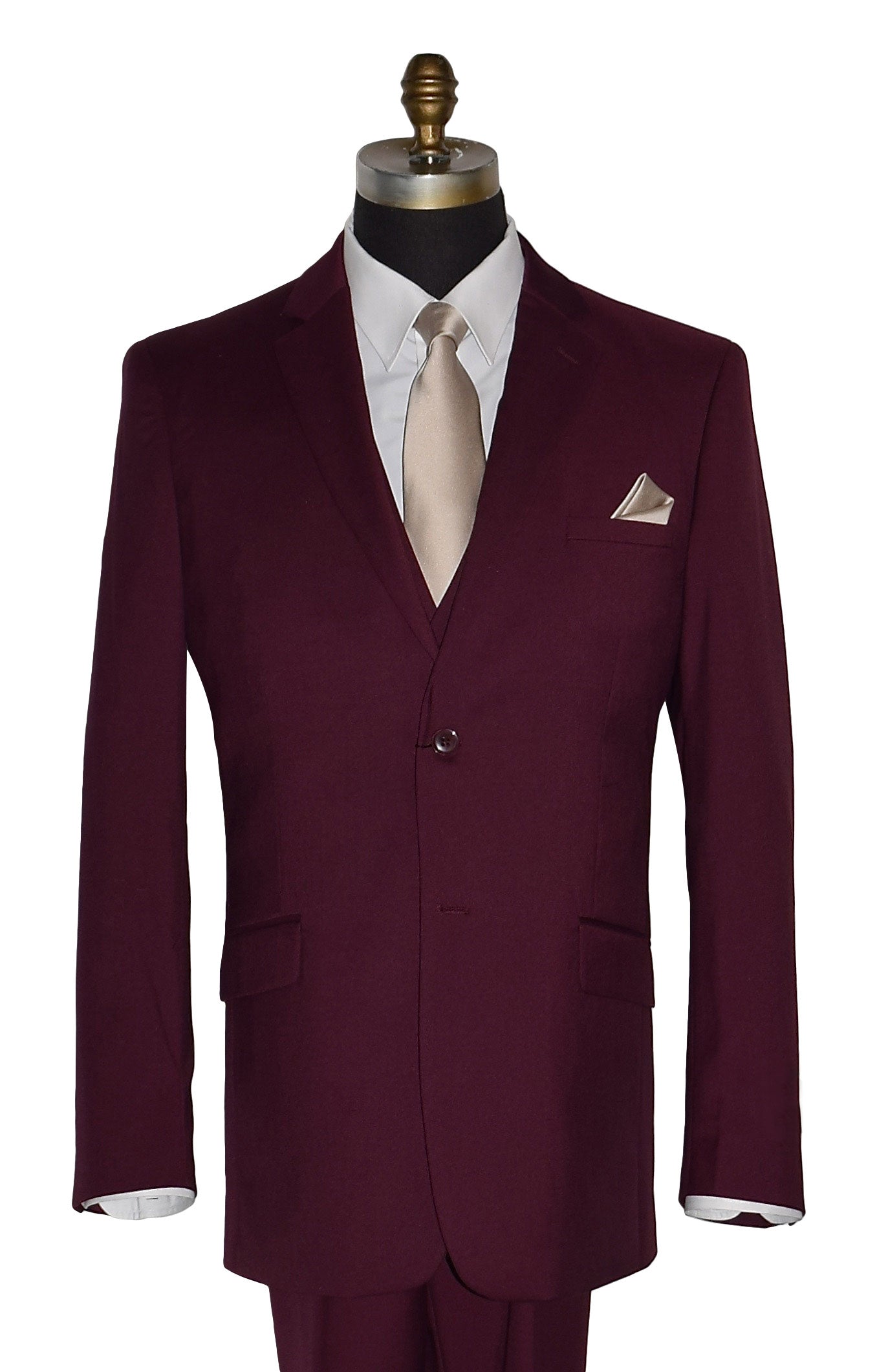 close-up view.life size mannequin wearing a burgundy 3-piece suit with a white dress shirt and a tan necktie and pocket handkerchief in front of a white background