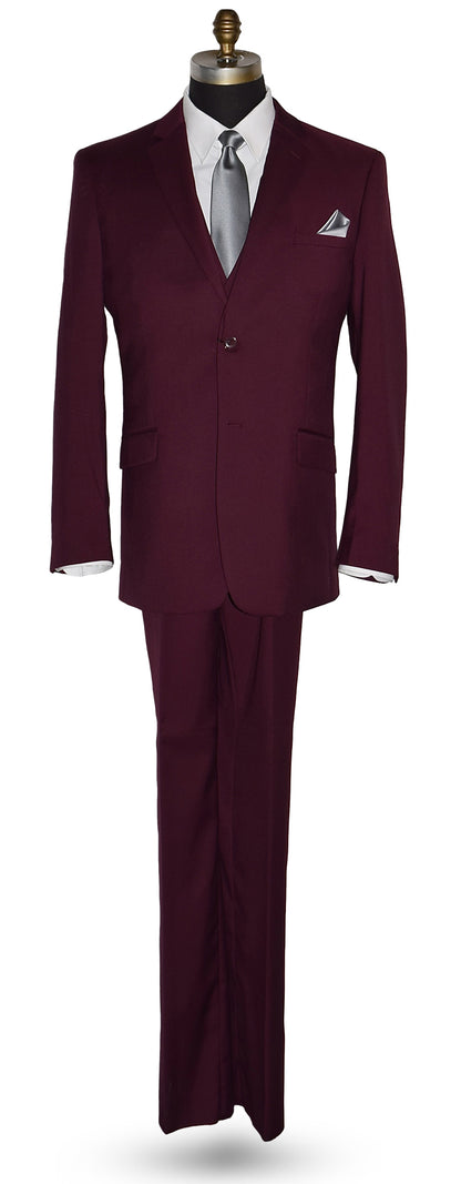 life size mannequin wearing a burgundy 3-piece suit with a white dress shirt and a gray necktie in front of a white background