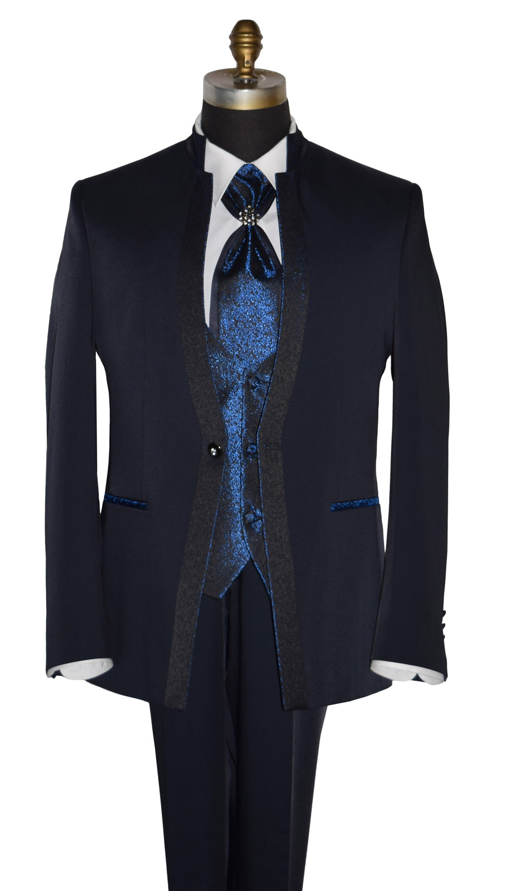 Navy blue nehru tuxedo with a blue vest on a mannequin against a white background