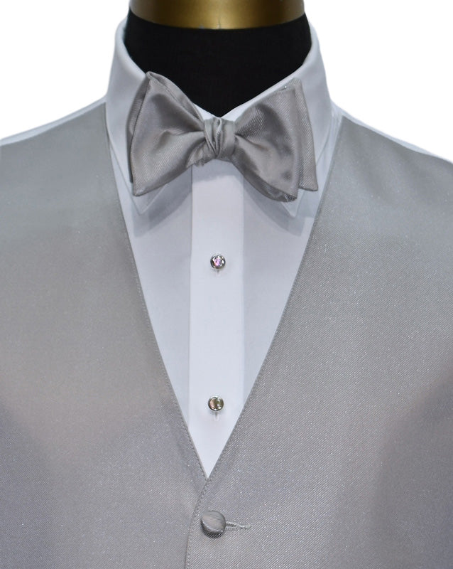 close-up front view Moonlight gray tuxedo vest and moonlight gray "tie-yourself" bowtie with cubic zirconia studs and cufflinks on a mannequin against a white background