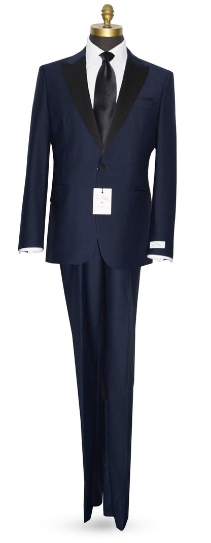 Navy blue tuxedo on a mannequin with a long black necktie against a white background
