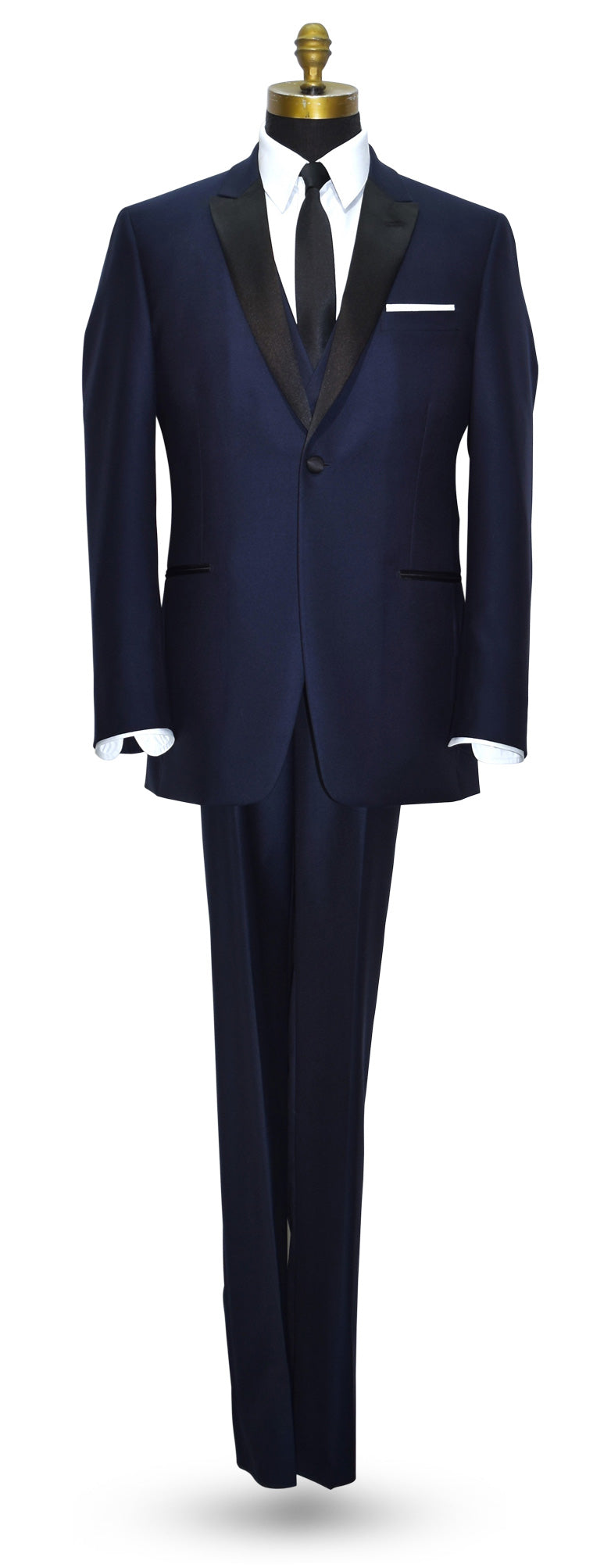 Life size mannequin wearing Navy-Blue peak lapel tuxedo with navy blue tuxedo vest and skinny black satin necktie against a white background