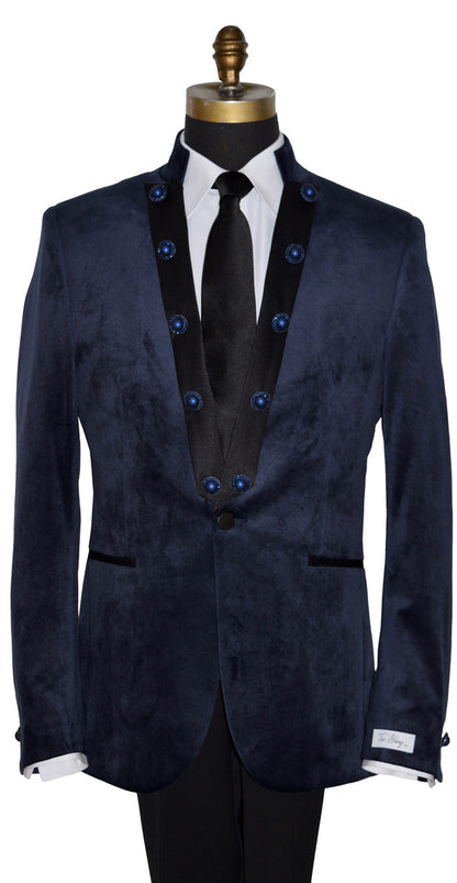 close-up mannequin wearing a navy velvet nehru collar tuxedo with a long black dress tie against a white background