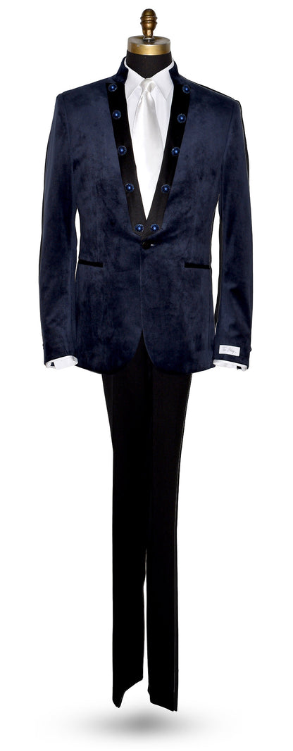 life size mannequin wearing a navy velvet nehru collar tuxedo with a long white dress tie against a white background