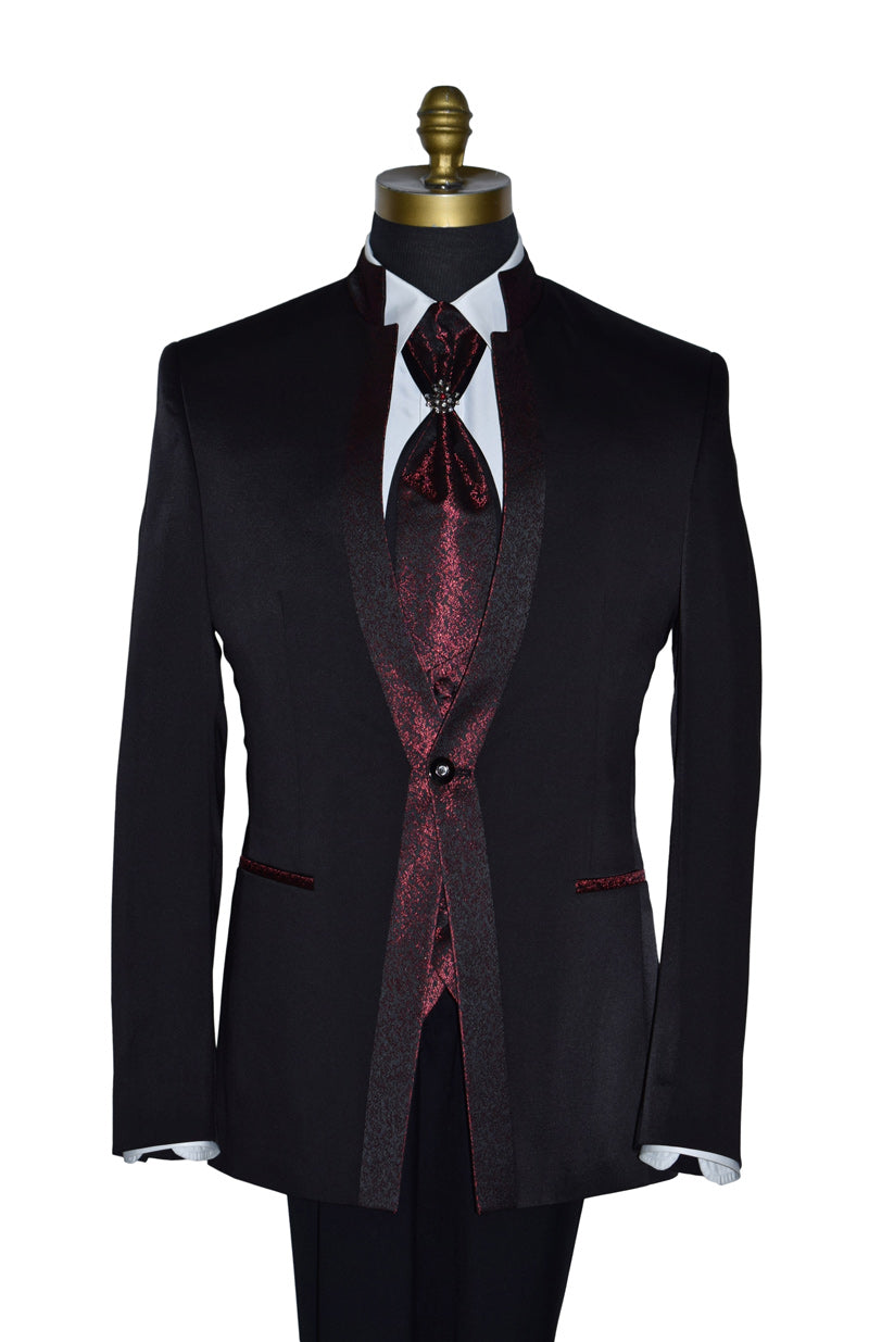 close-up black nehru tuxedo ensemble with red accents on a mannequin against a white background