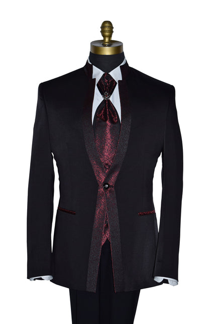 close-up black nehru tuxedo ensemble with red accents on a mannequin against a white background
