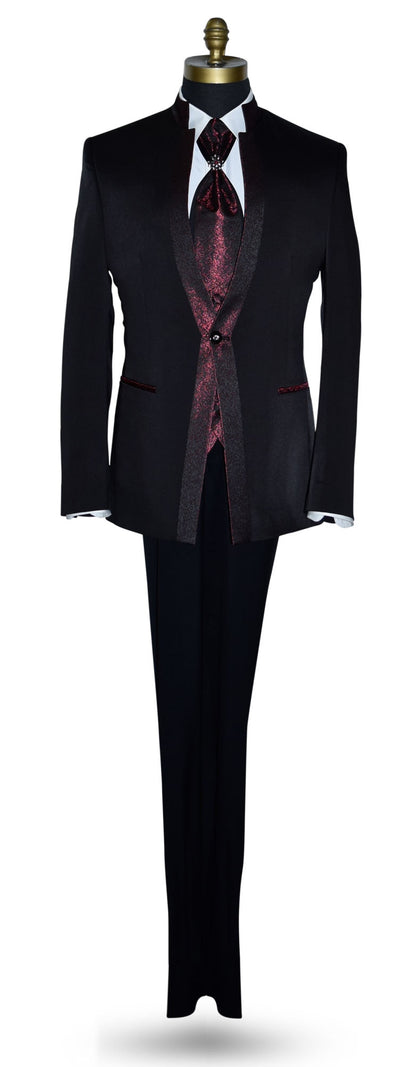 black nehru tuxedo ensemble with red accents on a mannequin against a white background