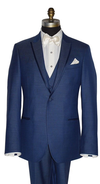 close-up mannequin wearing a "new blue" tuxedo with the matching new-blue tuxedo vest shown here with an ivory dress shirt and an ivory "tie-yourself" bowtie against a white background