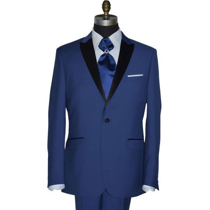 close-up front view of mannequin wearing a royal-blue tuxedo with black peak lapel, royal blue trousers, and a royal blue ascot tie, against a white background.