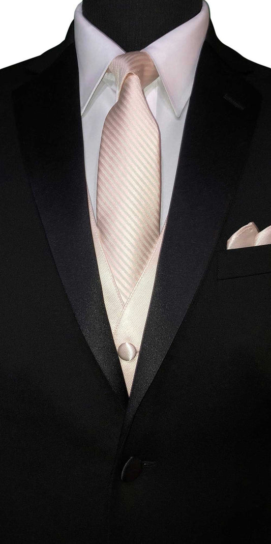 Black wedding suit with a nude-color striped necktie and pocket square on a white background