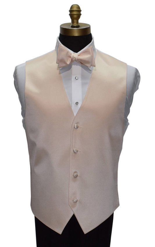 close up mannequin wearing a nude tuxedo vest and nude "tie-yourself" bowtie against a white background