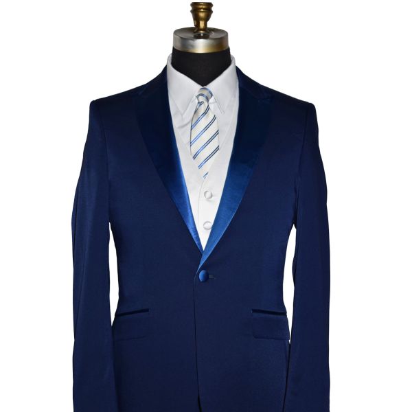 close-up Blue tuxedo on a mannequin with a white shirt and tie against a white background