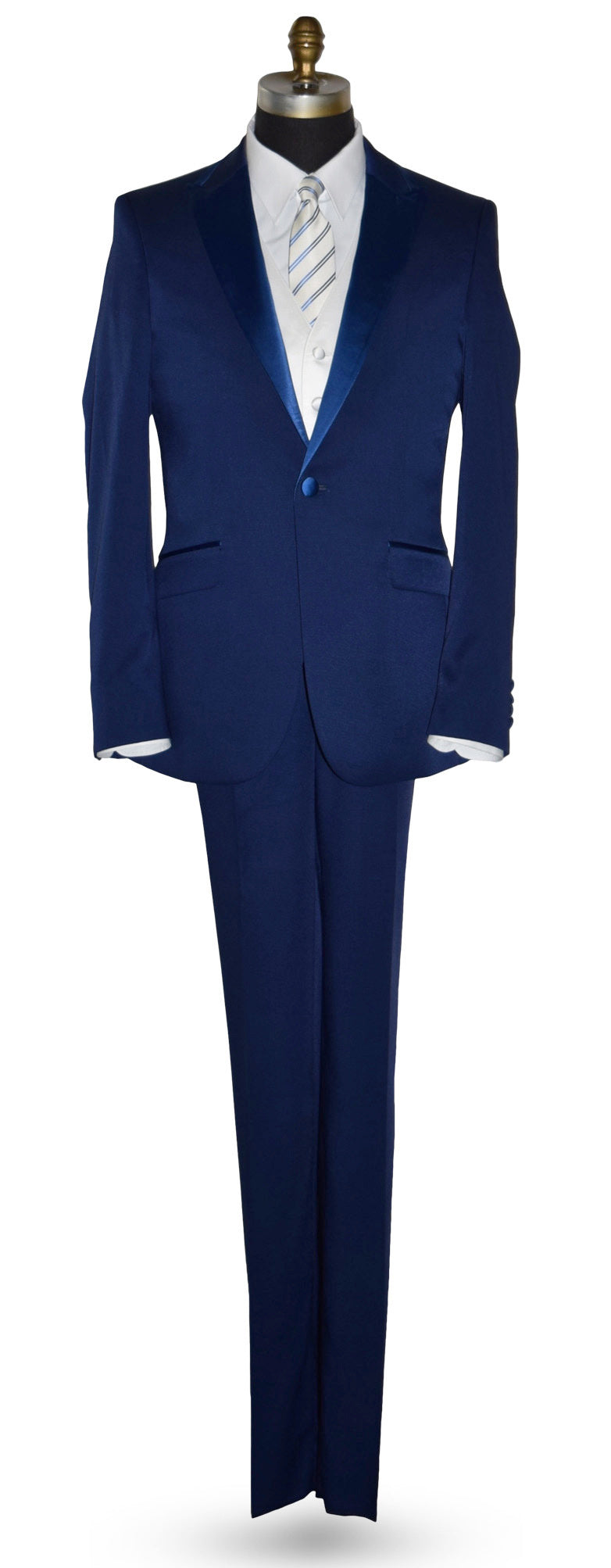 Blue tuxedo on a mannequin with a white shirt and tie against a white background
