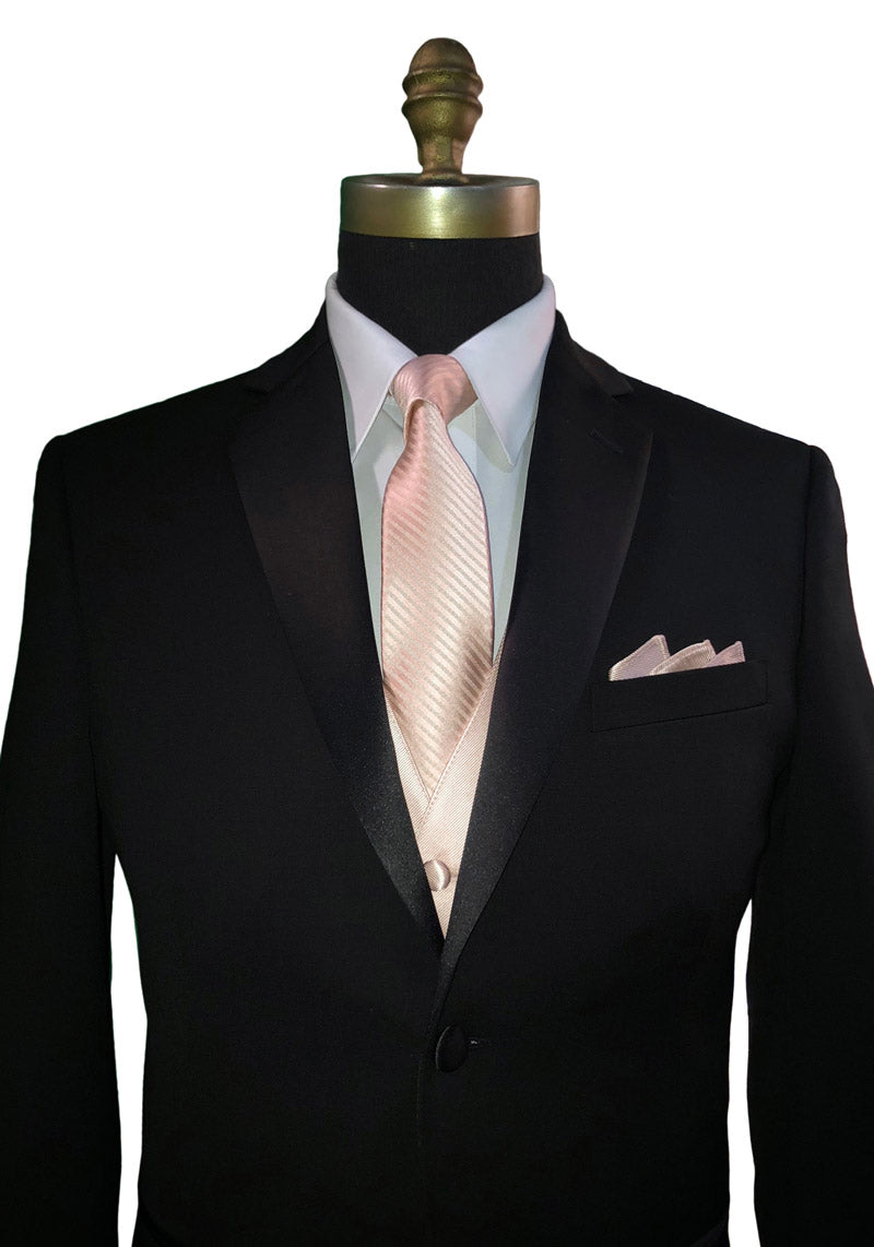 mannequin wearing a black notch-lapel tuxedo and white dress shirt and a petal necktie with stripes and a petal tuxedo vest and pocket handkerchief against a white background