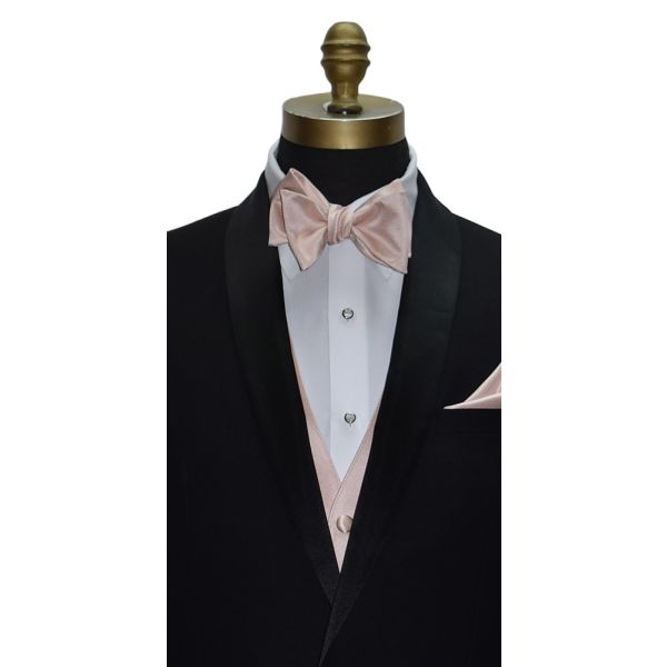 close-up black shawl-collar tuxedo with a petal tuxedo vest and petal "self-tie" bowtie and pocket handkerchief against a white background