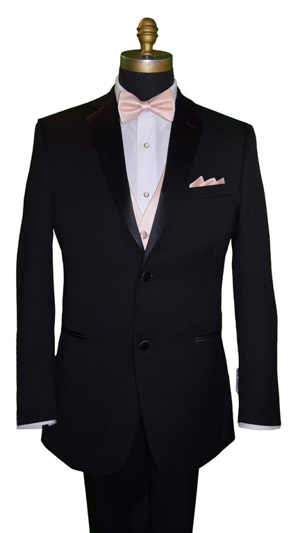 mannequin wearing a black notch-lapel and a white dress shirt together with a "pre-tied" petal bowtie and petal tuxedo vest against a white background