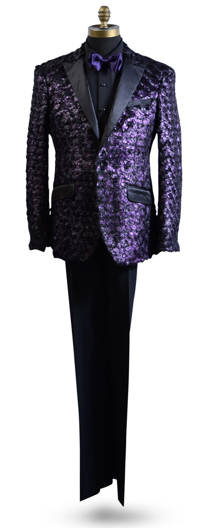 life size mannequin wearing a purple tuxedo with black lapels with a black tuxedo shirt and purple bowtie against a white background