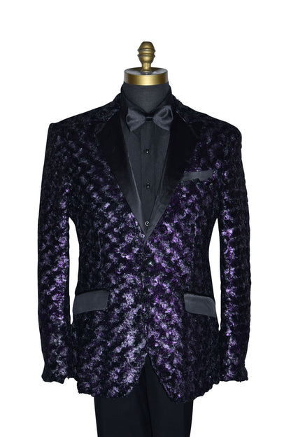 close-uplife size mannequin wearing a purple tuxedo with black lapels with a black tuxedo shirt and black satin bowtie against a white background