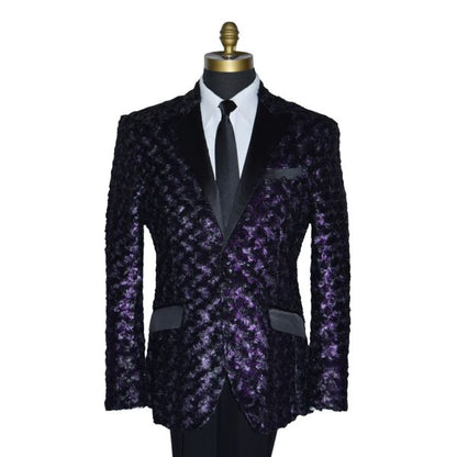 close-up life size mannequin wearing a purple tuxedo with black lapels with a white tuxedo shirt and long black skinny necktie against a white background