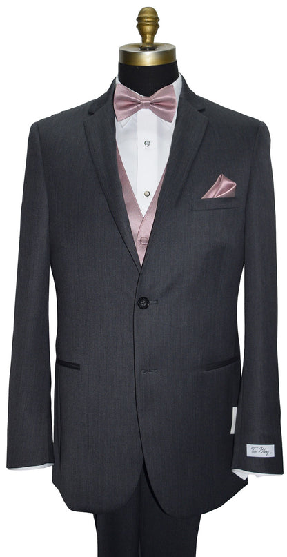 Gray wedding suit with quartz "pre-tied" bow tie and quartz tuxedo vest on a mannequin against a white background