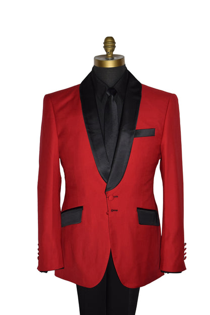close-up life size mannequin wearing red shawl collar tuxedo with a black tuxedo shirt and a long black necktie with black tuxedo pants