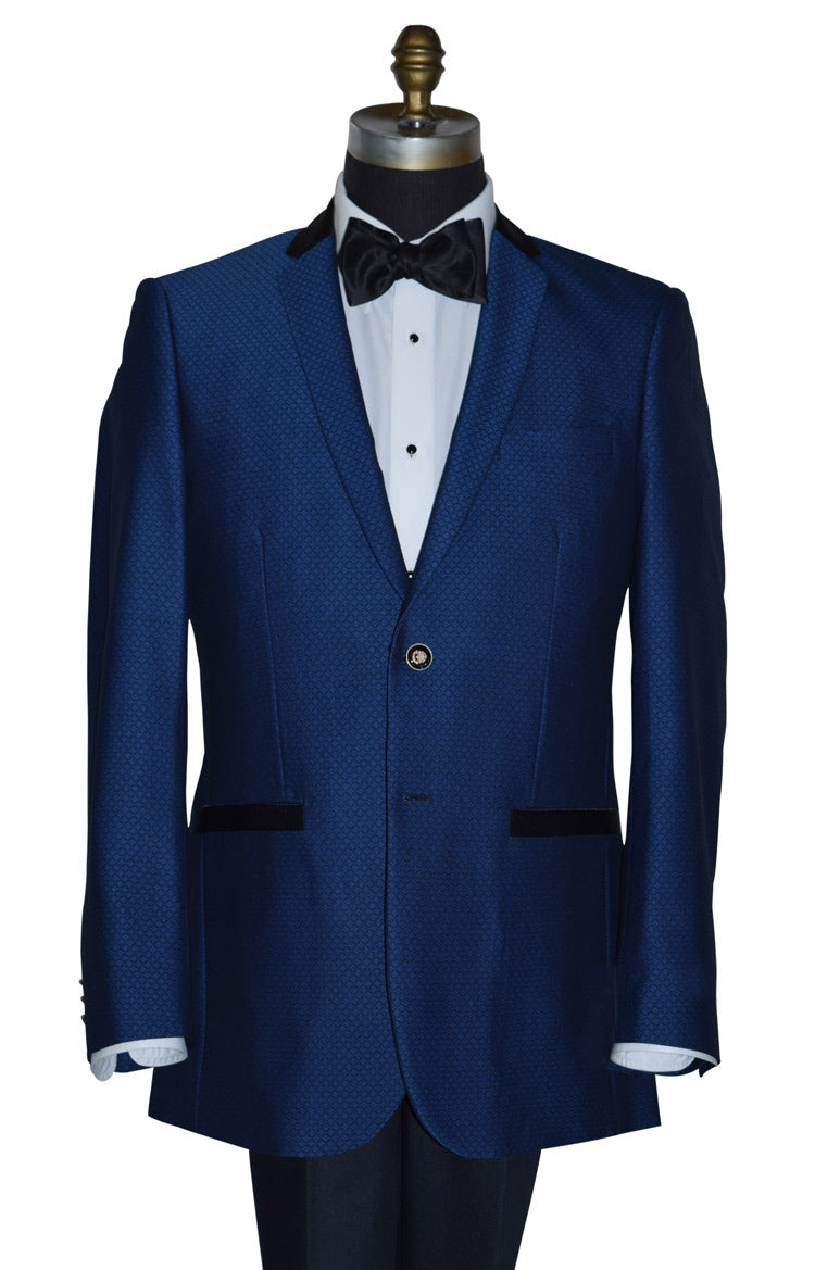 sapphire blue tuxedo jacket with a black satin bowtie against a white background
