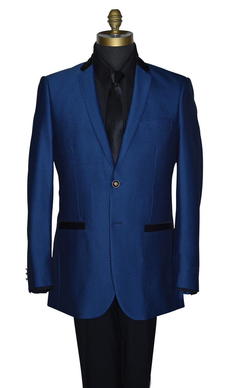 mannequin wearing sapphire blue jacket with a black shirt and a black necktie against a white background