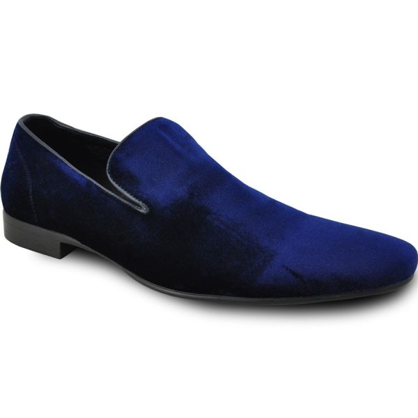 close-up side view men's blue velvet slip-on dress shoes against a white background