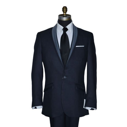 close-up life size mannequin wearing a serene blue shawl collar tuxedo with a wide black satin necktie against a white background