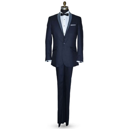 life size mannequin wearing a serene blue shawl collar tuxedo with a black skinny bowtie against a white background