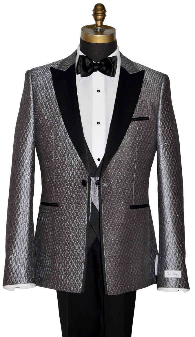 Silver-Gray peak lapel tuxedo jacket and vest on a mannequin with a white shirt and black bow tie.