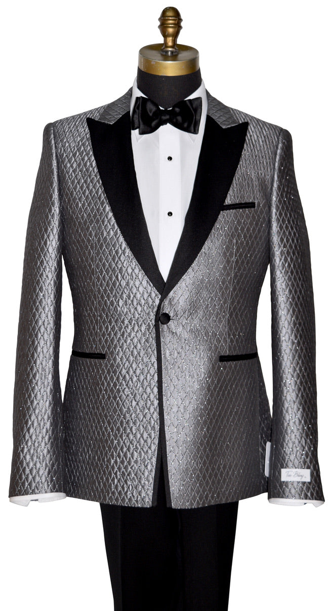 Silver-Gray Patterned tuxedo jacket with black lapels and a black satin tie yourself bowtie on a mannequin against a white background