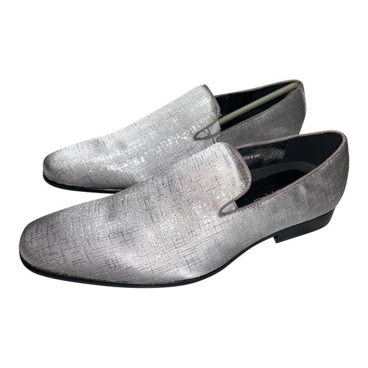 Pair of silver -gray mens loafers on a white background