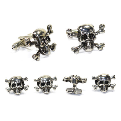 Set of silver skull and crossbones cufflinks and studs on a white background