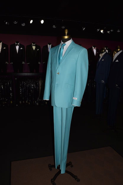 Mannequin wearing a tiffany blue suit with tiffany blue dress tie inside  mens store with other suits on display