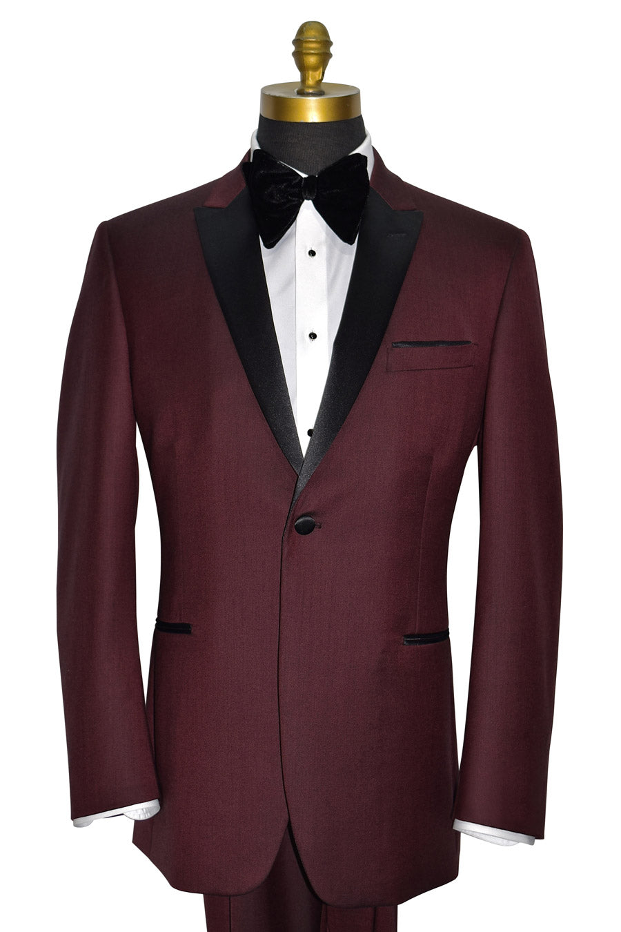 Burgundy tuxedo with black lapels on a mannequin against a white background