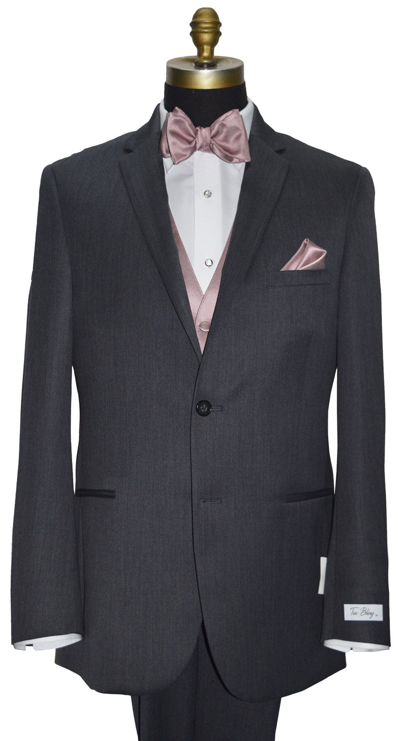 Charcoal gray wedding suit with quartz vest and bow tie that you tie yourself, and a quartz pocket square on a mannequin against a white background. Front view
