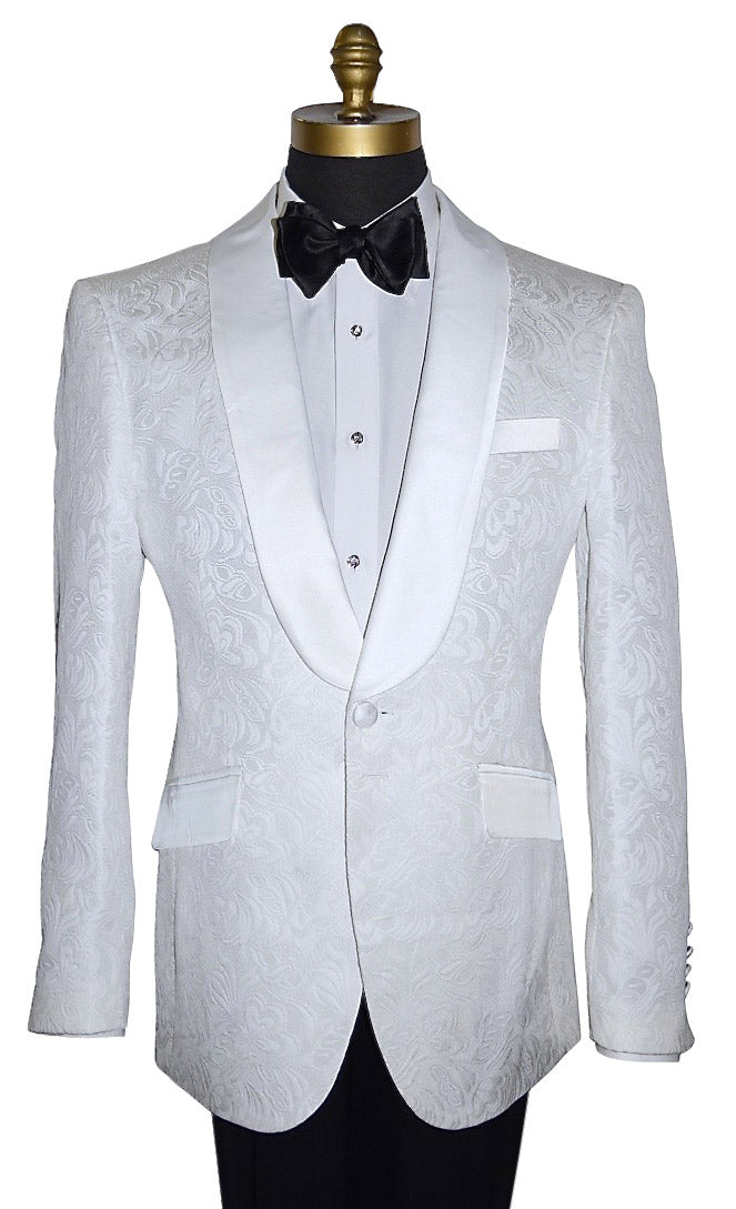 close-up mannequin wearing a white brocade tuxedo jacket with a black bowtie and black pants against a white background 
