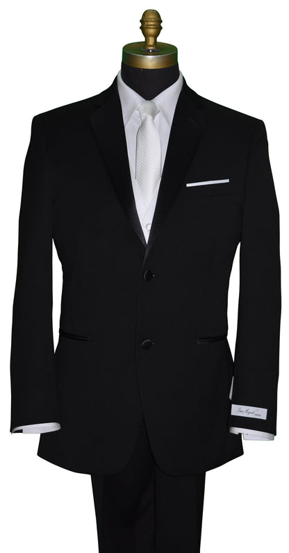 mannequin black tuxedo with "San Miguel Especial" branded label wearing a white vest and white long necktie with subtle stripe against a white background