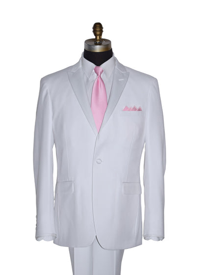 life size mannequin wearing white peak lapel tuxedo with mens long pink necktie and pocket square on a white background