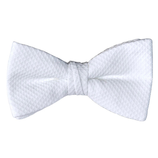 White pique bow tie on a white background
