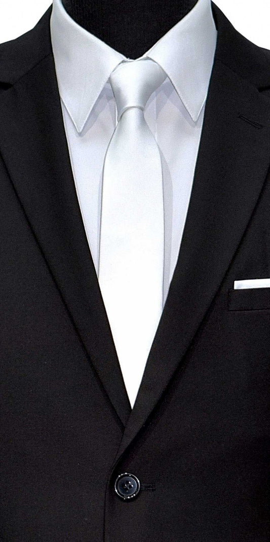 close-up mannequin wearing a black suit with a white shirt and white skinny necktie